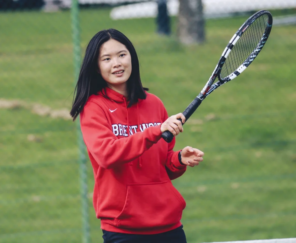 A tennis student working on their skills during practice
