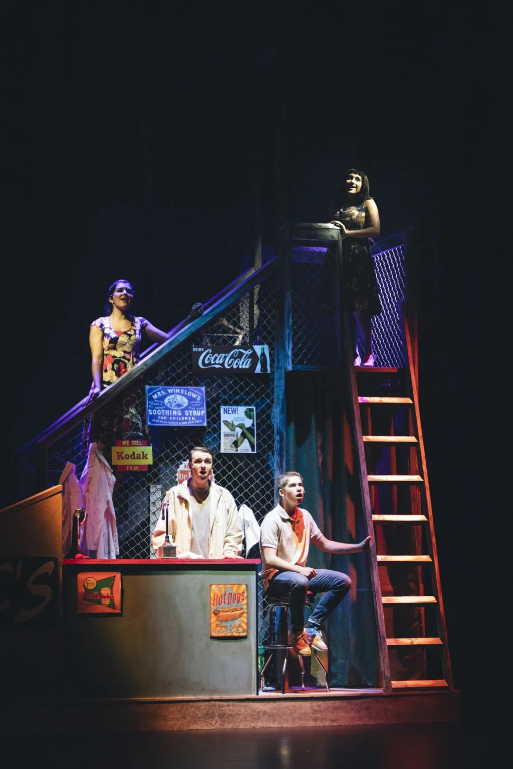 Private school students performing the musical West Side Story on stage