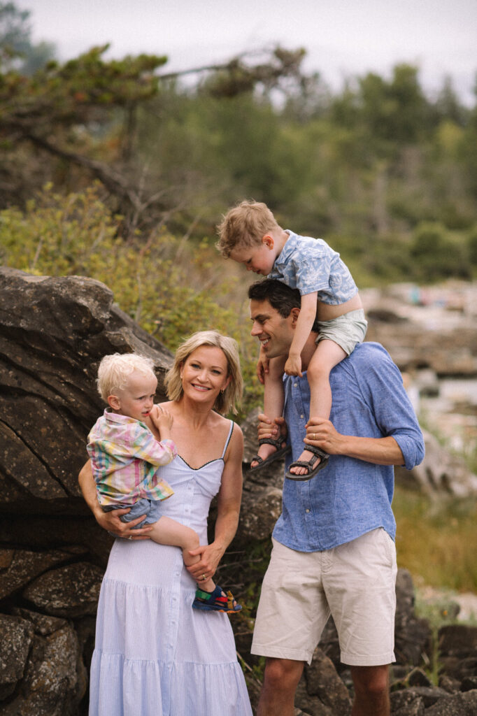 Alex Richards with her family outdoors on a sunny day