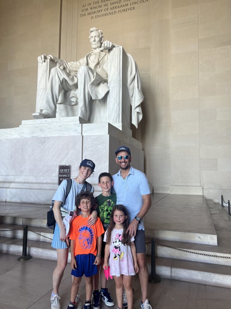 Kris (Larsen) Woldu and her family at the Lincoln Memorial in Washington, D.C.